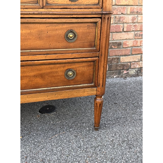 This is a beautiful 19th century French chest of drawers! The wood is a gorgeous auburn tone with little ornamentation,...