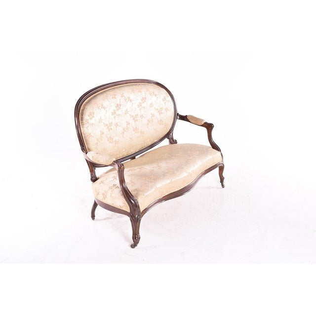 Canape Louis XV style. Beautiful finely carved rosewood sofa. Made in France around 1900. Concave back, upholstered in...