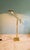 Articulated brass floor lamp with a counterweight system, Hollywood Regency style, 1970s-80s. Particularly original...