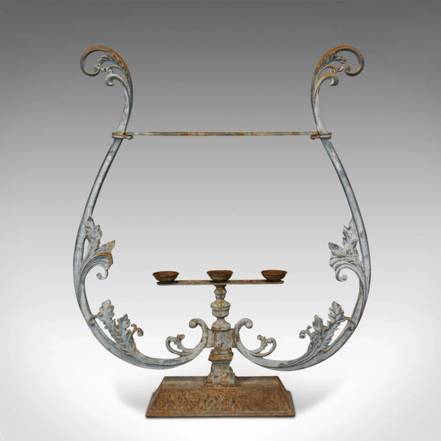 This is a vintage outdoor stand. A French, cast iron planter or stick stand with Art Nouveau taste, dating to the mid-20th...
