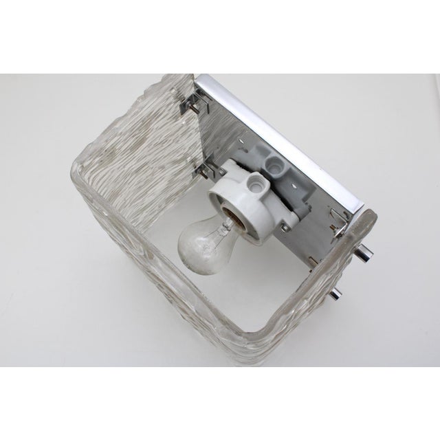 Chrome-plated wall plate with dispersion glass shade, E27 socket, suitable for damp rooms This piece is attributed to the...