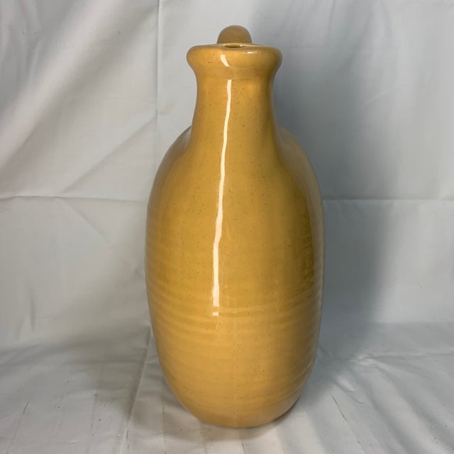 Add a pop of authentic mid-century charm to your home with this vintage Royal Haeger water jug/pitcher vase (Shape No....