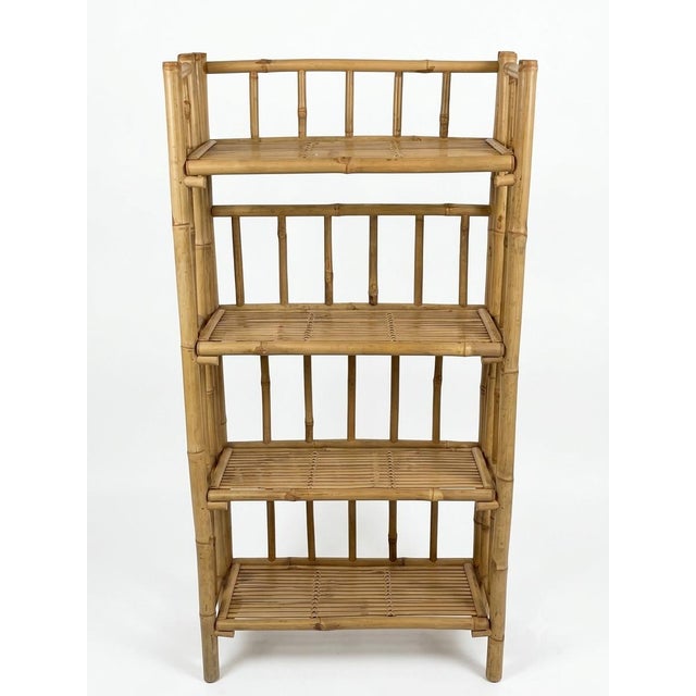 Embrace the effortless elegance of casual coastal living with this vintage mid-century four-tier bamboo etagere. Perfectly...