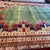 Abstract Vintage Turkish Rug 8'9"x11' – Green Field – Geometric Border For Sale - Image 3 of 4