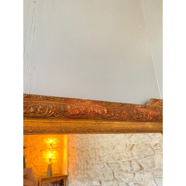 Napoleon III period mirror in stuccoed and patinated wood. Good overall condition, some minor losses. 75 x 105 cm.