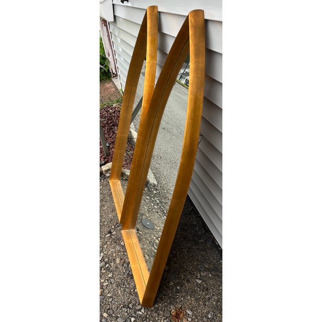 Fine pair modern Hollywood Regency style mirrors having gilt wood beveled frames and ready to hang.