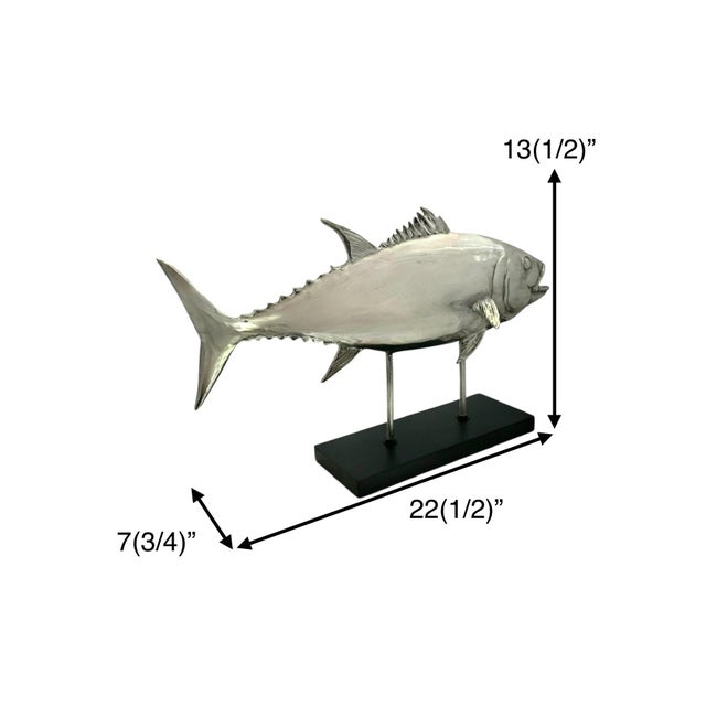 This large chrome/silver color tuna fish statue sculpture by Decor is perfect for coastal nautical decor. The sculpture...