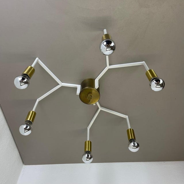 Article: ceiling light Producer: Origin Italy in the manner of Stilnovo, Gio Ponti Age: 1970s This modernist light was...