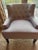 Purchased in 2017, these gray Royersford arm chairs are being sold as a pair. They feature button-tufted backs, sloped...