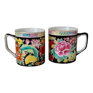 Vintage Chinoiserie Black Mugs With Colorful Floral Design - A Pair For Sale