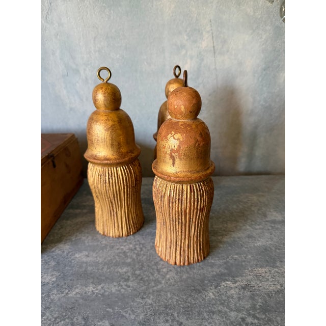 19th century French wood carved and gilded tassel.These tassels were used as decorative tie backs for opulent draperies.