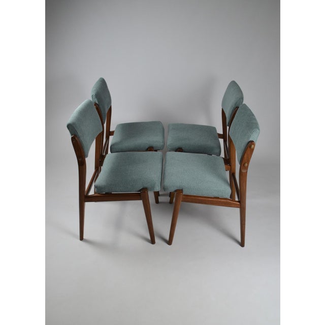 Superb set of 4 scandinavian teak chairs. Fully reupholstered with quality fabric. Solid teak structure. Very nice airy...