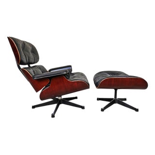 Set of 670 Lounge Chair and 671 Ottoman in Rosewood by Charles and Ray Eames for Herman Miller, 1960s For Sale