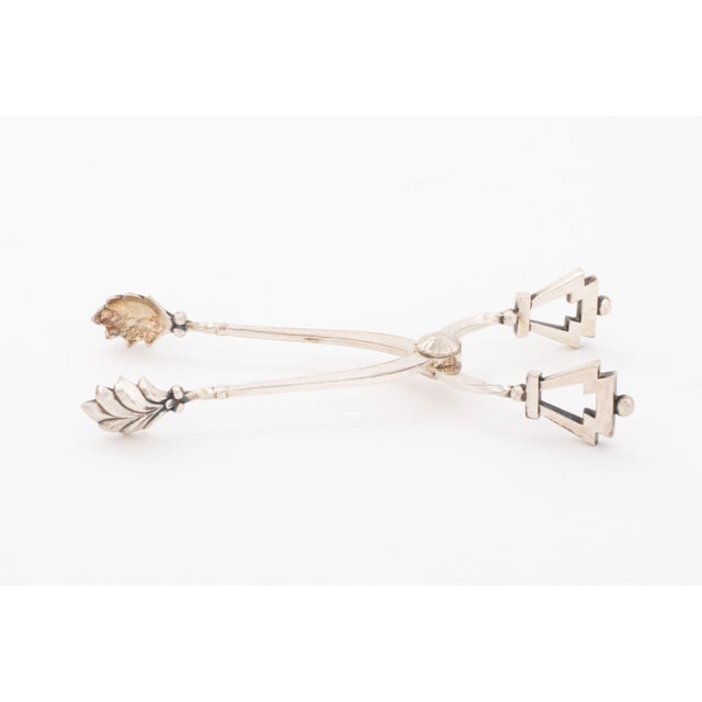 Georg Jensen "Pyramid" Sterling Silver Ice Tongs, marked. Weight: 2.12 ozt; 5.75" H x 2.25" W. Provenance: From a New York...