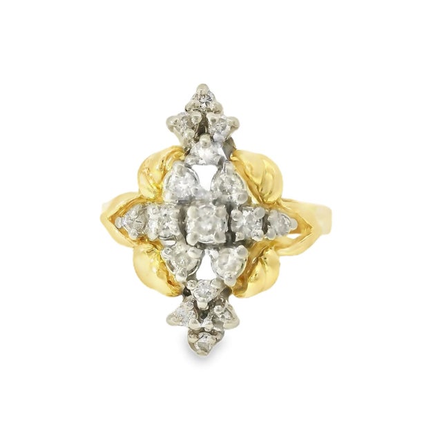 Elegant 14K Yellow Gold Filigree Diamond Marquise Ring featuring 17 brilliant round diamonds set within an intricate...