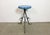 Vintage Industrial factory stool made in former Czechoslovakia during the 1960s It features a blue painted wooden seat and...