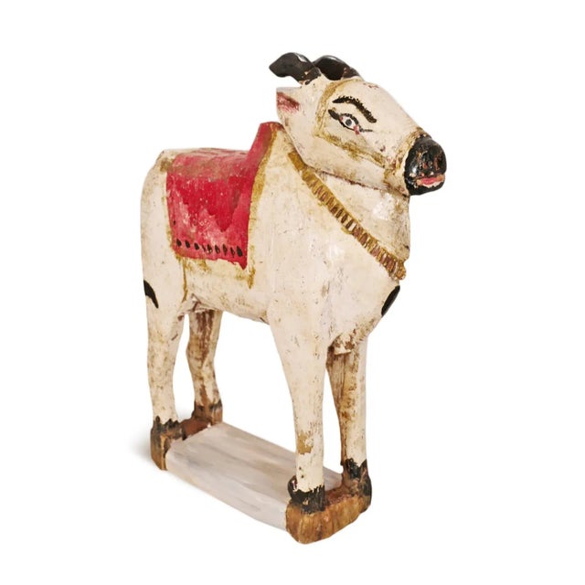 Vintage wood painted small Brahma cow statue. Hand crafted in rural Rajasthan.