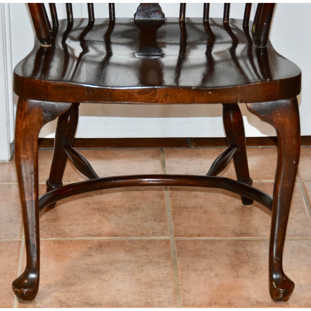 Windsor Spindle Wheel Back Armchair A stunning piece fit for any classic furniture space, Crafted from a solid wood stick...