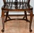 Windsor Spindle Wheel Back Armchair A stunning piece fit for any classic furniture space, Crafted from a solid wood stick...