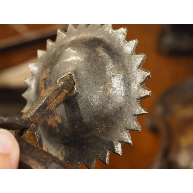 Inspired by Islamic art and architecture still present in Iberia during the 1800s, this wrought iron door knocker features...