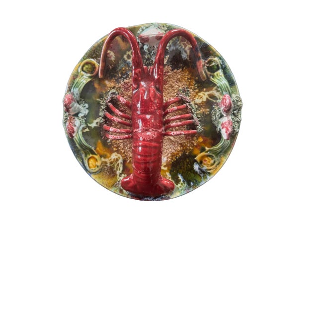 Beautiful antique majolica palissy plate with a large lobster and other crustaceans. Approx. 10” diameter x 1.5” depth