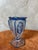 Art Deco vase in blue and clear Bohemian crystal, dating from the 1920s. This elegant piece features a slender shape...