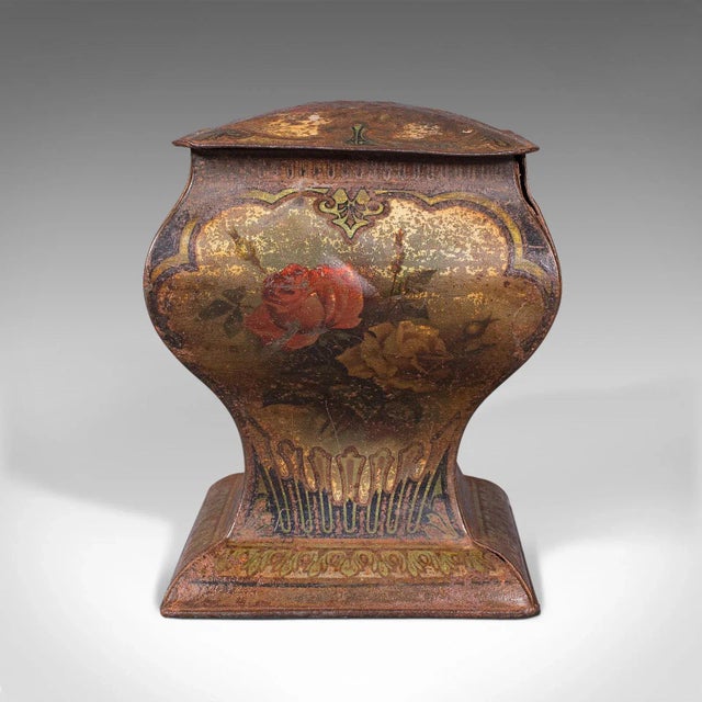 This is an antique decorative biscuit tin. An English, printed shop retail container for Gray Dunn and Co, dating to the...