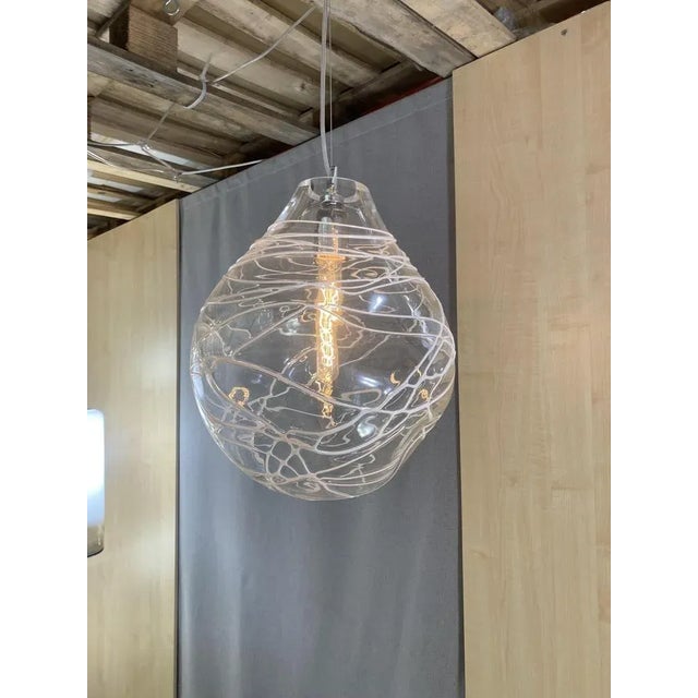 Contemporary Transparent with Wite Wire Pendant in Murano Glass Impressive contemporary-modern transparent pendant in...