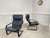 Pair of Ikea black leather armchairs dating from the 1980s. Comfortable and elegant with their timeless vintage design,...