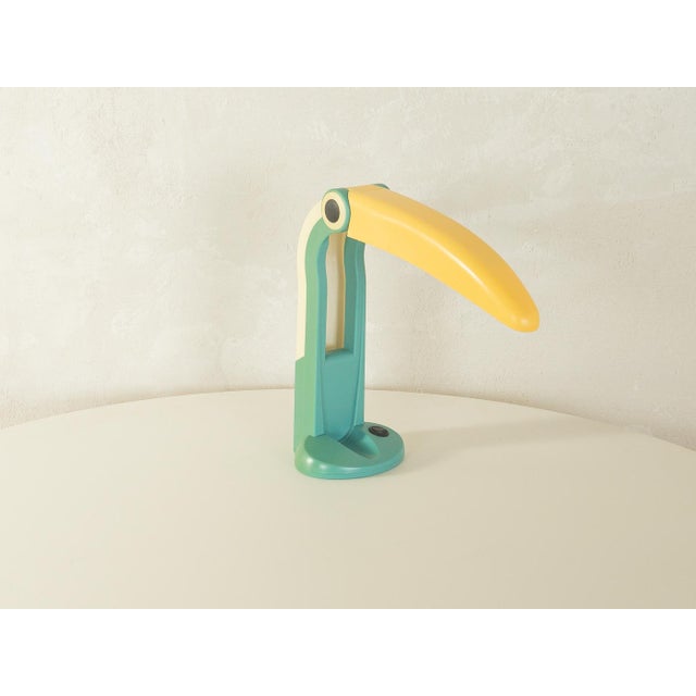 Postmodern toucan desk lamp from the 1980s by H.T. Huang for Huanglite. The flexibly adjustable tilt angle of the beak...