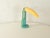 Postmodern toucan desk lamp from the 1980s by H.T. Huang for Huanglite. The flexibly adjustable tilt angle of the beak...