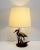 Elegant Table Lamp Brass 1970, representing a Heron surrounded by reeds and resting on a branch. Symbol of Peace, the...
