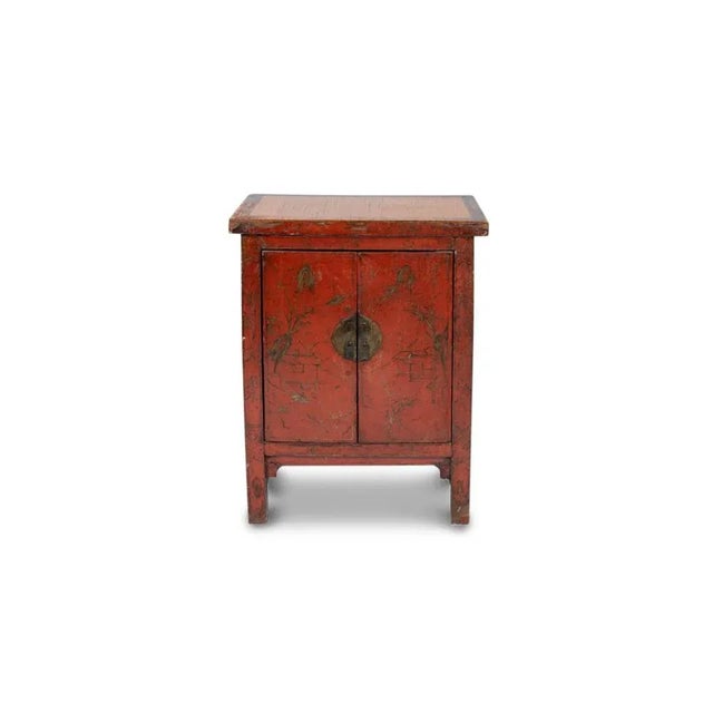 Rectangular Chinese sideboards in red tones, opening through a door on the front. Work carried out in the 19th century....