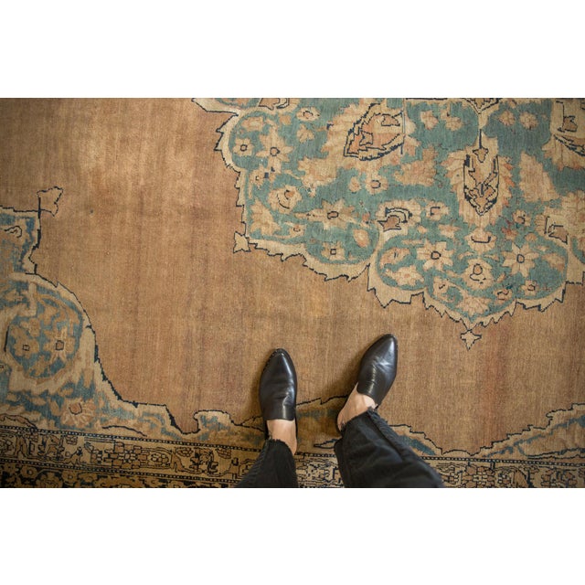 :: Oversized center medallion with scalloped trefoil contour adorned at either end by double tiered finials atop an open...