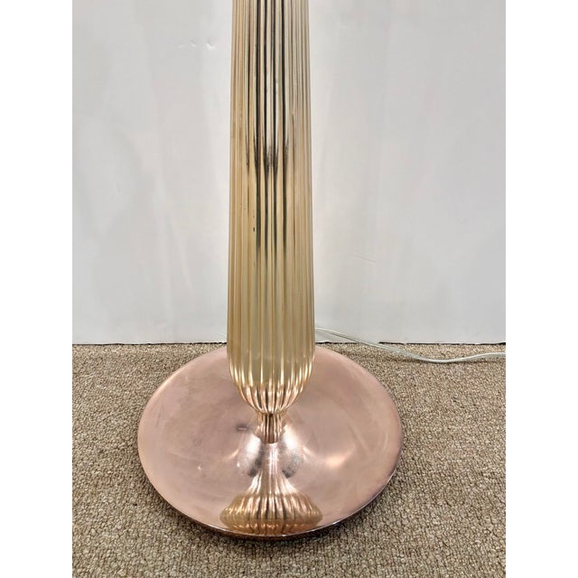 Stylish Barbara Barry Art Deco Reeded Lamp. Rose gold color with round base. Showroom floor sample.