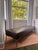 Authentic B&B Italia "Charles" bench designed by Antonio Citterio. Manufactured in 1998. Features premium, rich brown...