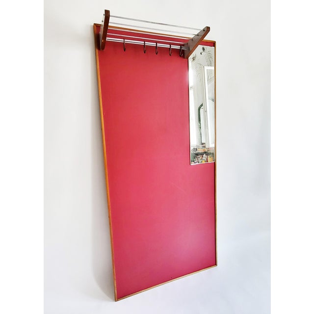 A sculptural, functional piece of modernist art - streamlined, space-saving and practical. This minimalist wall-mounted...