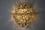 Superb Kinkeldey wall lamp designed and produced in germany in the 1970s. Cut crystals spread over 5 levels of a golden...