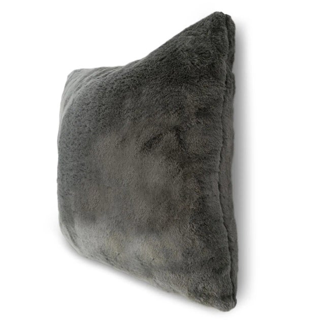 Grey faux rabbit fur pillow. Super soft with plush insert.