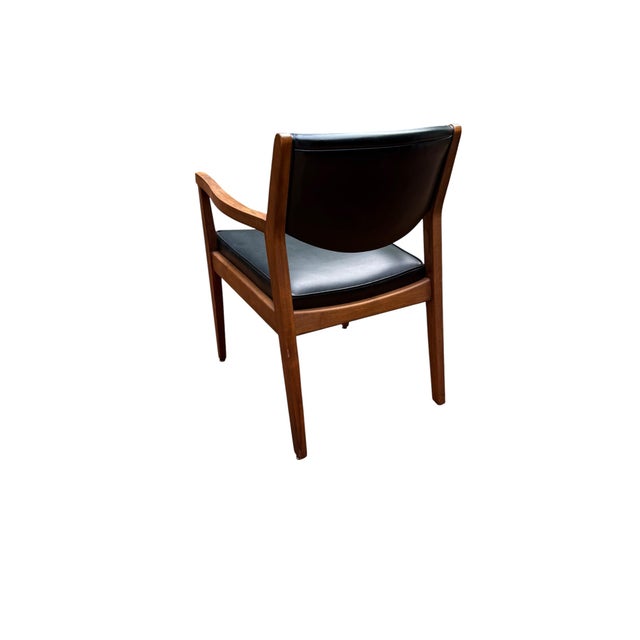 Elevate your office or living space with this iconic Mid-Century Modern armchair by the renowned Alma Desk Company of High...