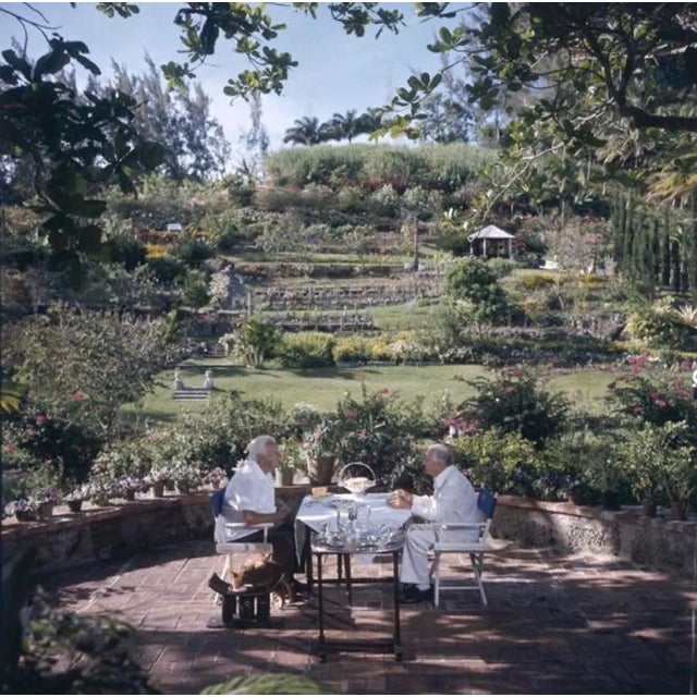 Slim Aarons, Dining Al Fresco, Estate Stamped Photographic Print, 1976 / 2020s For Sale