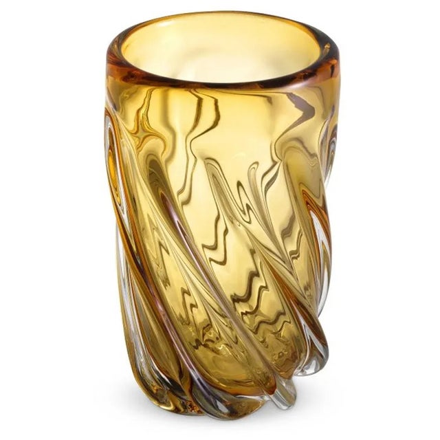 Handmade from yellow glass it features an elegant swirl pattern. Each piece is made by hand by a skilled artisan and...