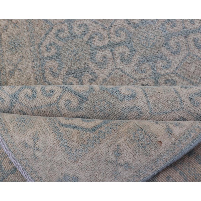 Afghan Khotan Tribal Runner in Ivory With Soft Blue and Sand Motifs For Sale - Image 9 of 10