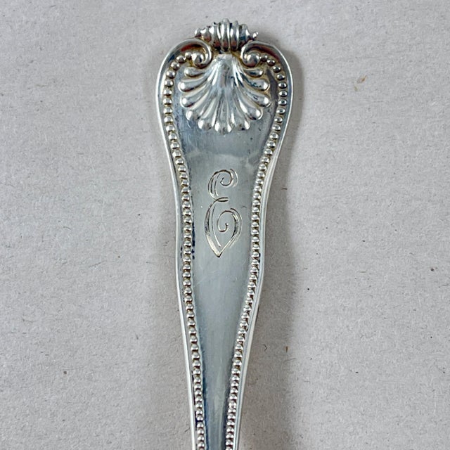 A set of ten Estate Sterling silver teaspoons, in the Newport Shell pattern, made by Frank Smith, Gardner, Massachusetts,...