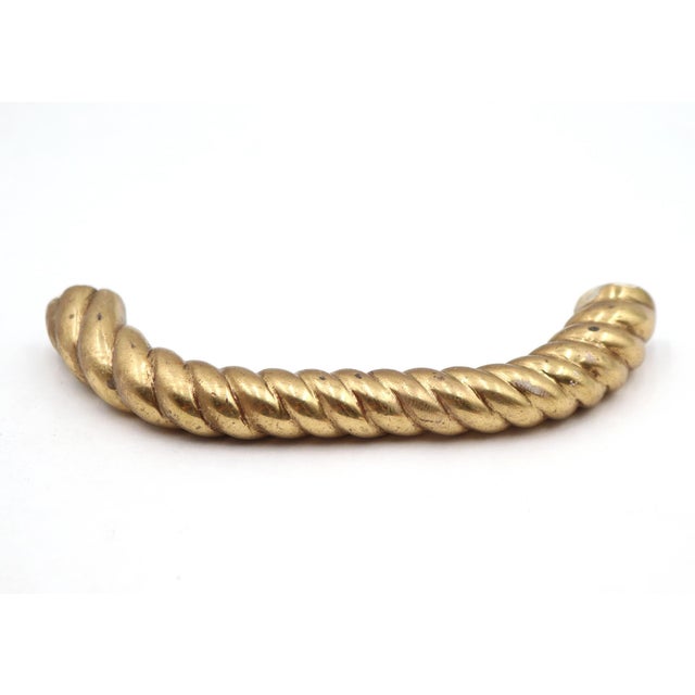 This brass drawer pull was acquired from the Waldorf Astoria Hotel on Park Avenue in New York City. A Waldorf Astoria...