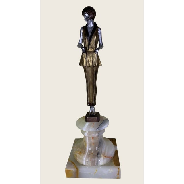 12.25” high including base, a very attractive cold painted example of this nice model, base has been replaced with a...