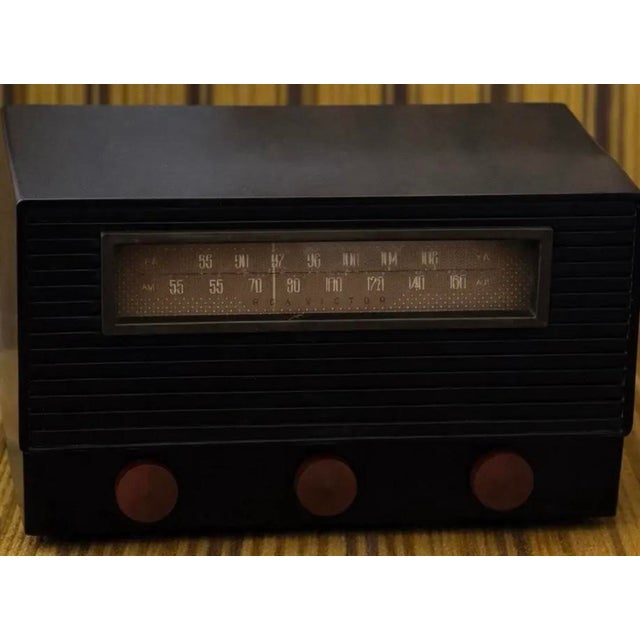 Fully functional when powered, the radio produces the soft ambient glow characteristic of early tube receivers. A refined...