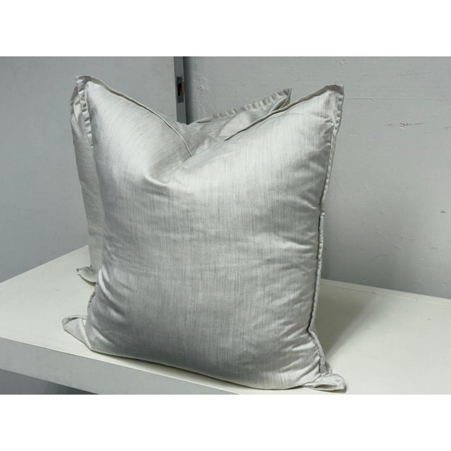 Design Plus Gallery presents a pair of Accent Pillows from Niche. The silver-gray fabric displays a subtle linear texture...