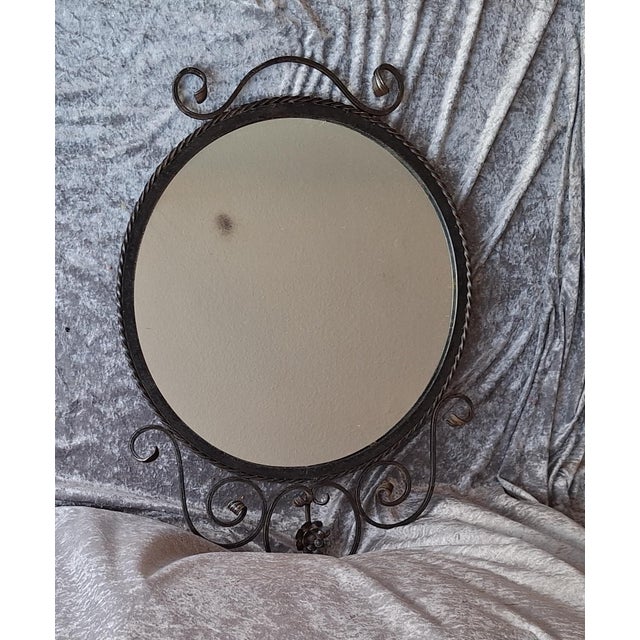 Vintage Round Wall Mirror with Black Wrought Iron Frame, 1970s, in Good conditions. Designed 1970 to 1979