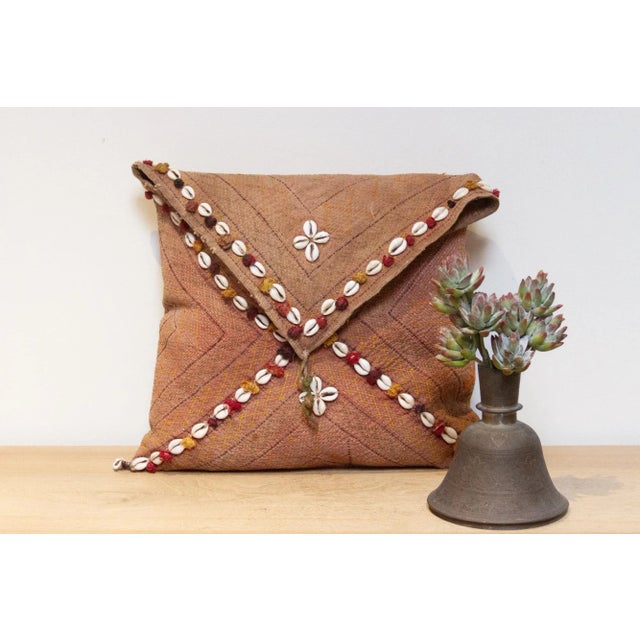 Quilted by the gypsy woman of the Saami community often reusing fabrics from clothing. This antique tribal pillow feature...